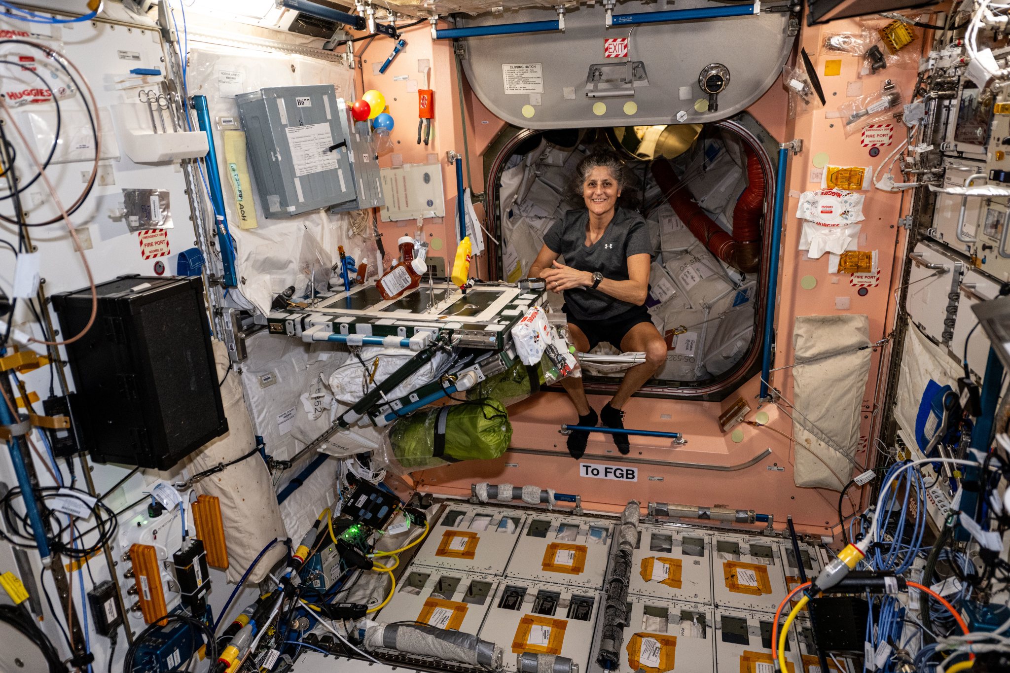 NASA astronaut and Expedition 72 Commander Suni Williams is pictured inside the International Space Station's Unity module.