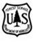 Title: Forest Service logo - Description: Logo that reads:" Forest Service U S Department of Agriculture" all enclosed in a shield shape with a tree shape in the middle.